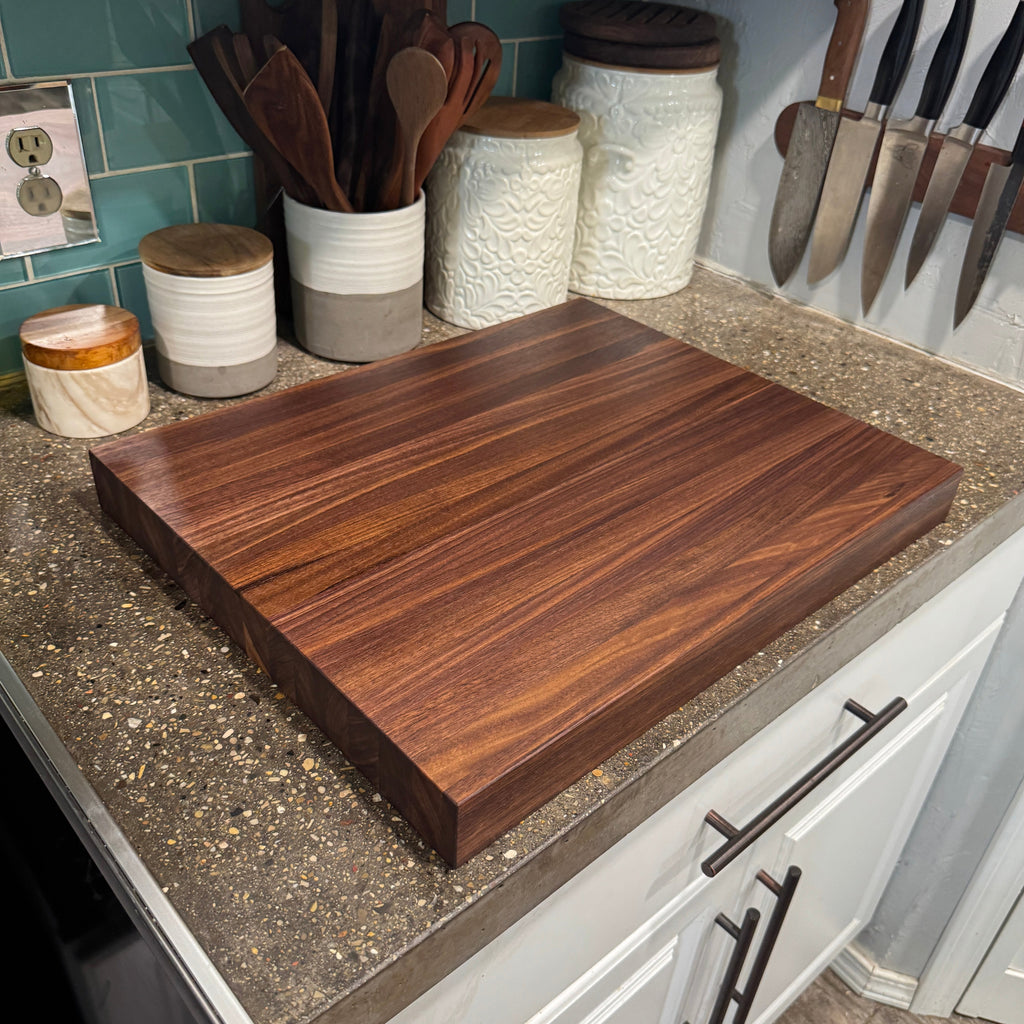 walnut cutting board on counter top