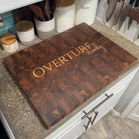 cutting board on counter top in kitche