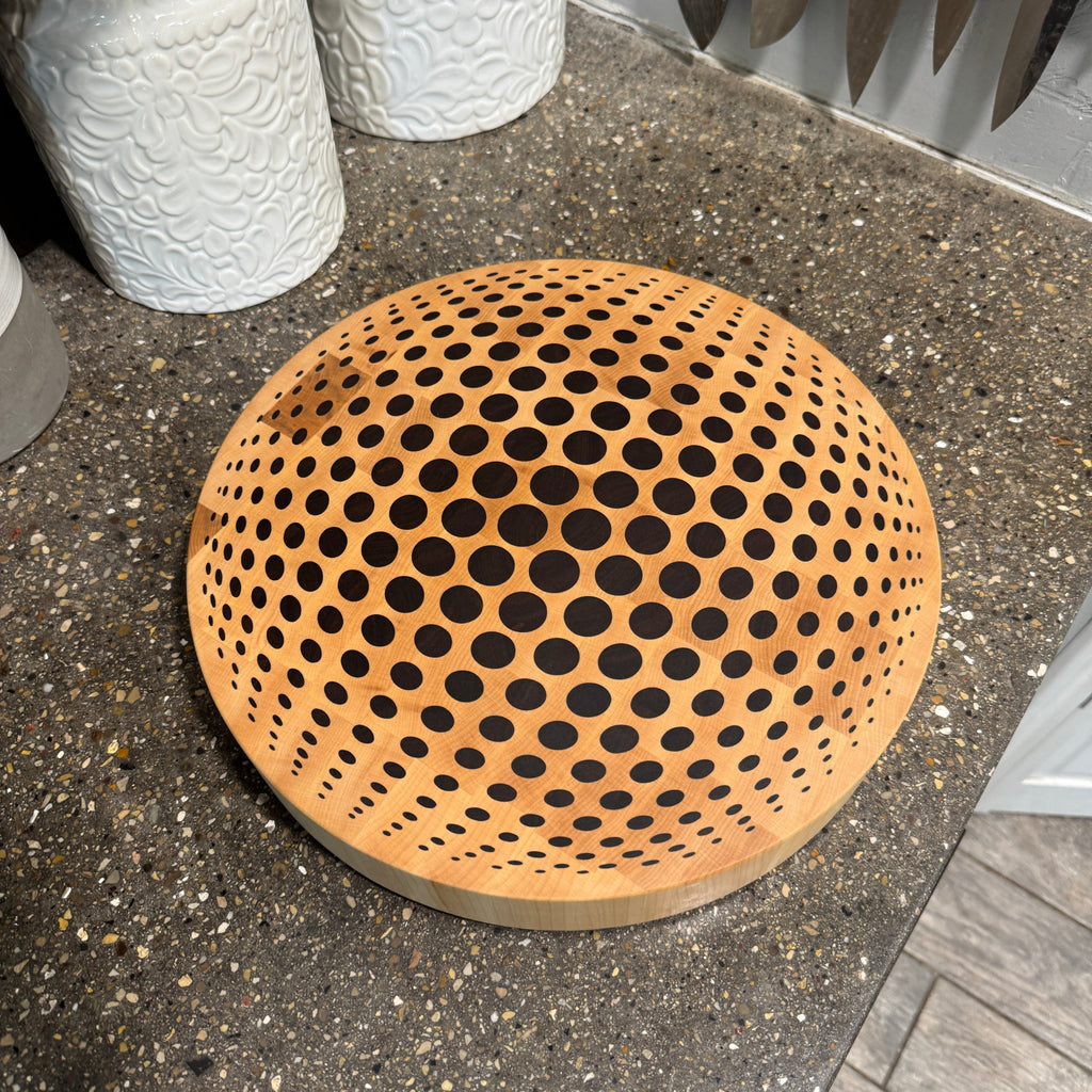 round cutting board on counter top