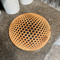 round cutting board on kitchen counter